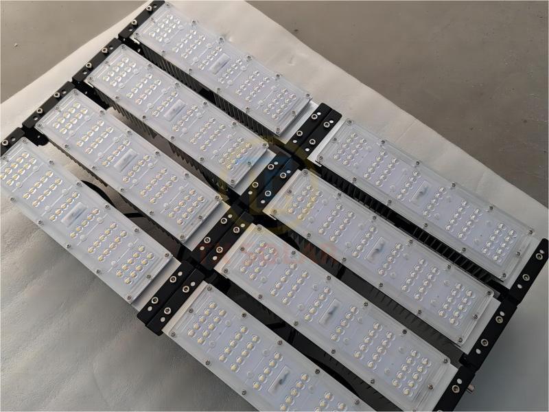 How many watts of LED flood light does an indoor basketball court use?